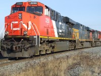 CN 309 comes to a stop to let the 23 and 148 pass by.