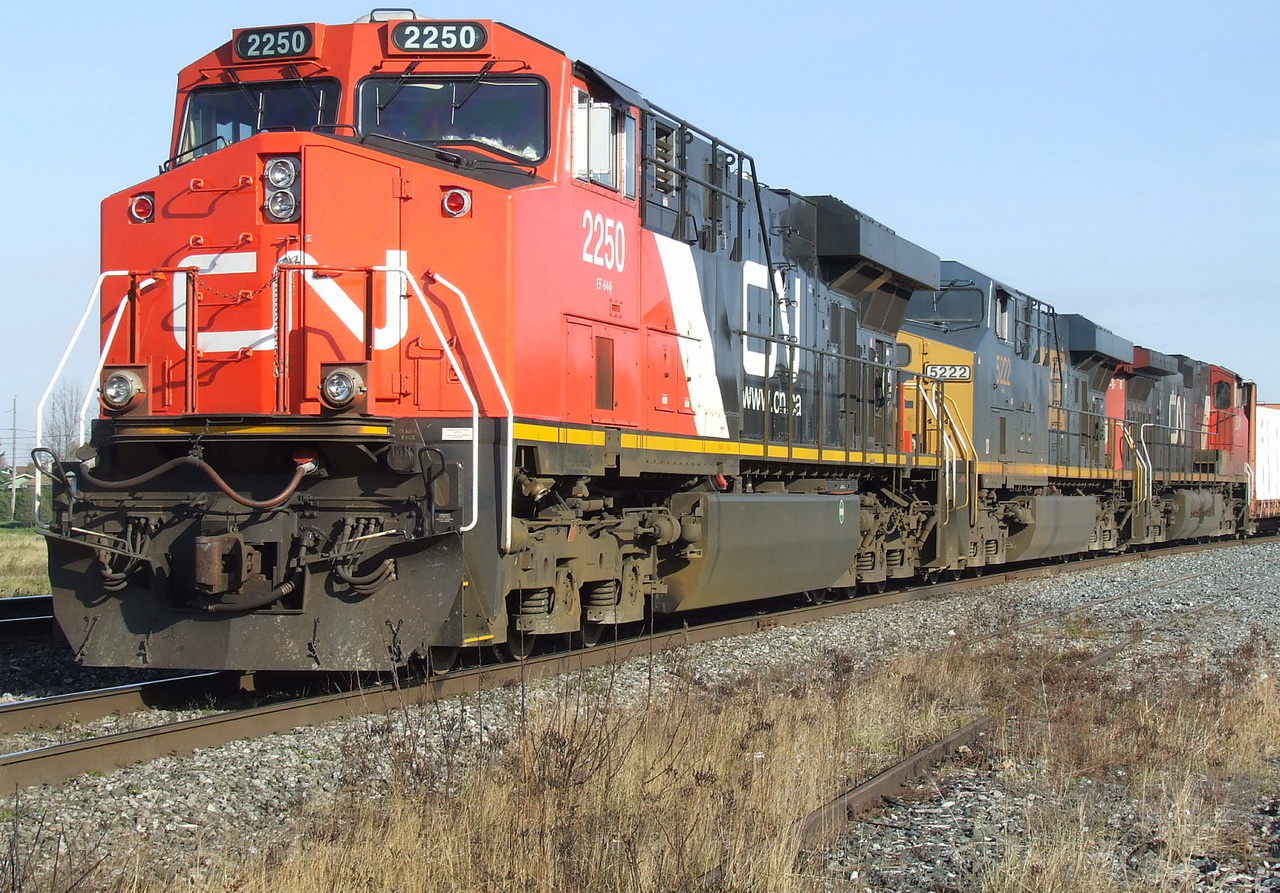 CN 309 comes to a stop to let the 23 and 148 pass by.