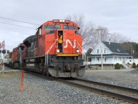 CN 401 gets ready to stop and open the switch to cut out cars on the the Bécancour sud.