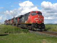 CN 401,one CN,s oldest train No on the drummond approaches the crossing with horns blaring.