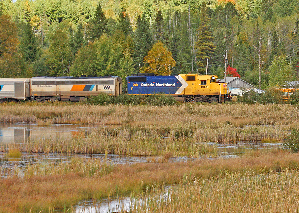 ONR 698 pulleed by 1809 passes through Scotia Junction with just five days of scheduled Northlander train service remaining. The remaqins of the connecting track roadbed from the long gone Parry Sound Colonization Railway to the Northern and Pacific Junction Railway (now the CN Newmarket Sub that the Northlander is pictured on) can be seen in the foreground. Both lines were subsequently taken over by the Grand Trunk Railway before being absorbed into the CN system.