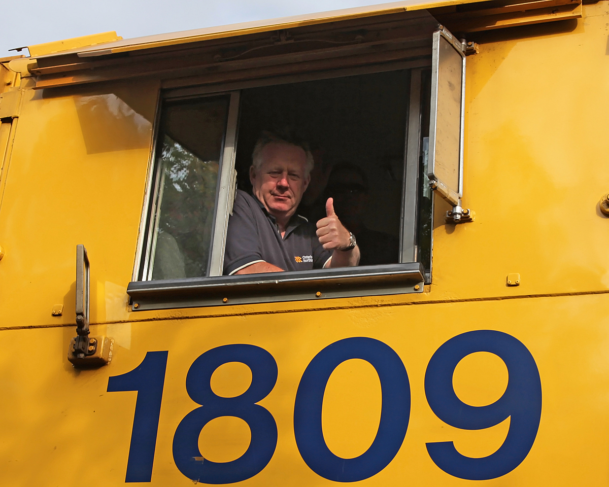 Engineman Wayne Sykes puts on a brave front as he gives a thumbs-up for the photographer as we bid farewell at Gravenhurst Station.