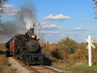 The fireman puts on a smoke-show as the engineer (who looked alarmingly like part-time HLBR engineer Don Mason) blows the whistle for the 7th Line crossing south of Beeton on thispreviously unplanned 5th run on Thanksgiving Day 2012. A higher than expected crowd turnout made this extra run necessary and even it was almost standing room only! 