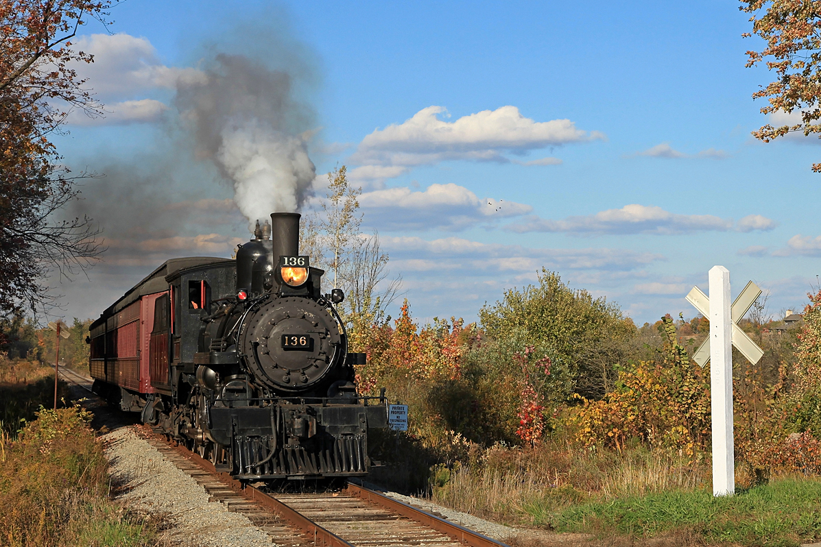 The fireman puts on a smoke-show as the engineer (who looked alarmingly like part-time HLBR engineer Don Mason) blows the whistle for the 7th Line crossing south of Beeton on thispreviously unplanned 5th run on Thanksgiving Day 2012. A higher than expected crowd turnout made this extra run necessary and even it was almost standing room only!