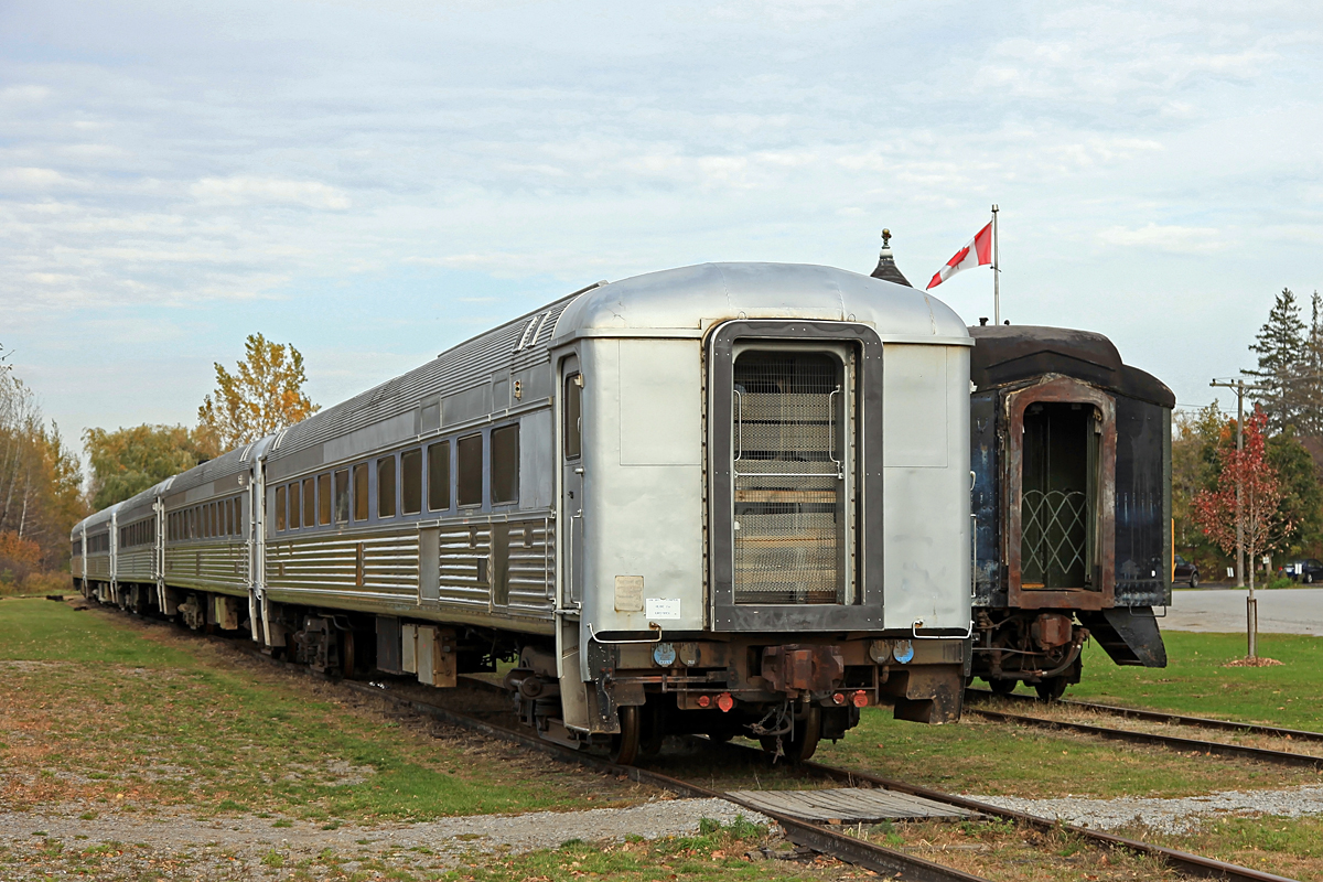 These 5 cars began life as Budd RDCs. They were de-powered and converted to commuter coaches years ago. Morerecently they were modified by John and Rita Carroll to run excursions on their Guelph Junction Express, Since that operation ceased they had been looking for a new home and eventually found it here at Uxbridge, where they will be put into service on the York-Durham Heritage Railway. While we lament the passing of the Guelph Junction Express, we can take consolation that they found a good home here.