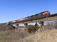 A colourful lashup creeps along the Humber Bridge with 5736, 2552, BCOL 4626 and JLCX 547.