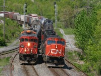 CN X392 led by 5611 rolls off the hill beside CN 394 - Sometimes things just come together!