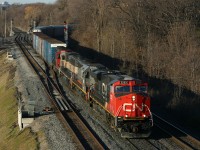 CN 392 rolls off the Dundas Sub with CN 2252, WC 6931, BNSF 9425 and CN 5381 