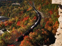 CN 2566 brings train 332 down the Niagara Escarpment at Mile 3 of the Dundas Subdivision around some spectacular fall colours.