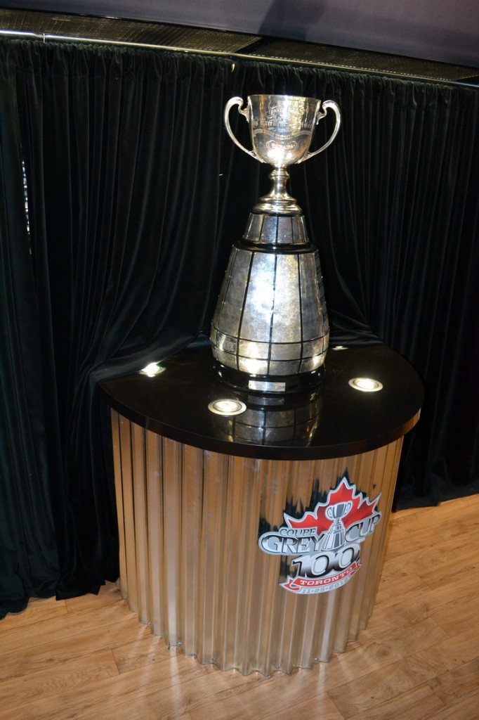 The Grey Cup, onboard CP car #103, posing for pictures.