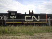 CN 0000 sitting idle just outside the fenced compound of CN's Transcona Work Equipment Repair Facility.