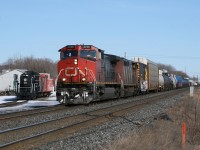 CN 369 screams by the Memory Jct Museum as a CN Ten Wheeler looks on.  369's trip is about to get a whole lot longer, CN 121 has just stalled at Newtonville and 369 has been volunteered to give up his trailing unit.