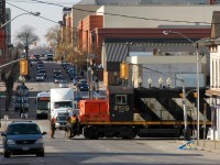 CN 4129 protected by it's crew enters Colborne street