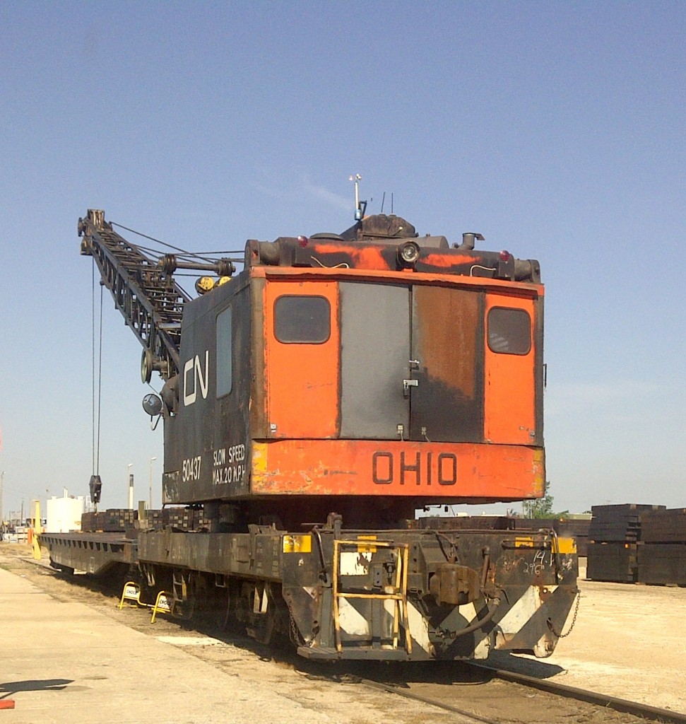 CN 50437, an Ohio model DE 400 locomotive crane will be celebrating its 40th birthday next year.  Built for CN in 1973, this particular crane has a 2-foot elevated operators cab to improve sightlines into open top railcars to aid in material loading and unloading.  The crane sits in the afternoon sun feeling lonely on the day after her long time operator 'Ray' retired from CN.