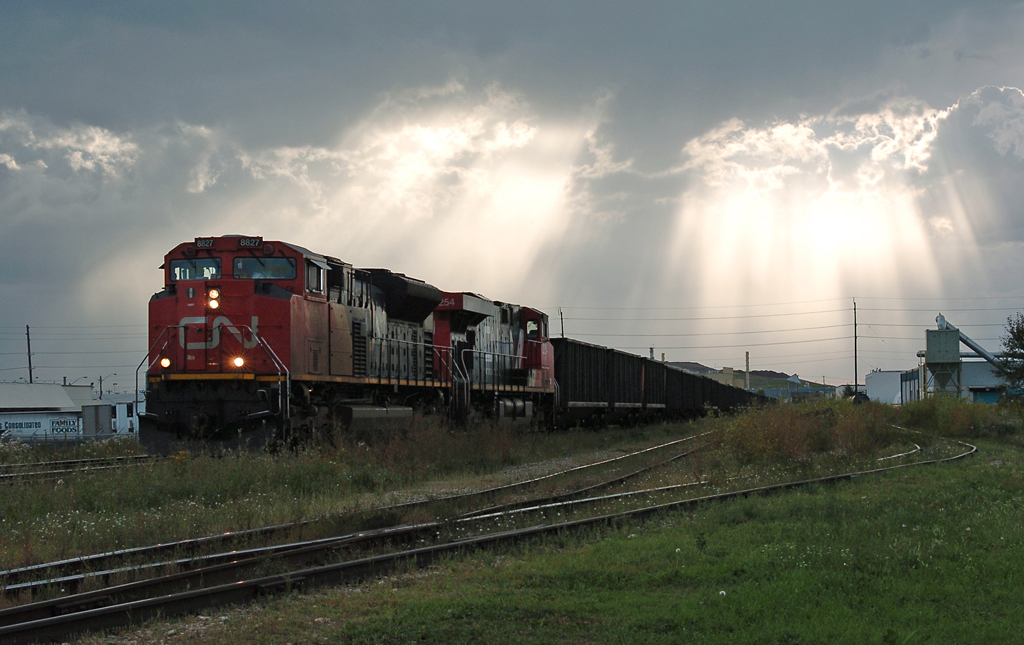 I just had to slightly underexpose the train to get this amazing sky to show up. After-dinner summer railfanning at its finest.