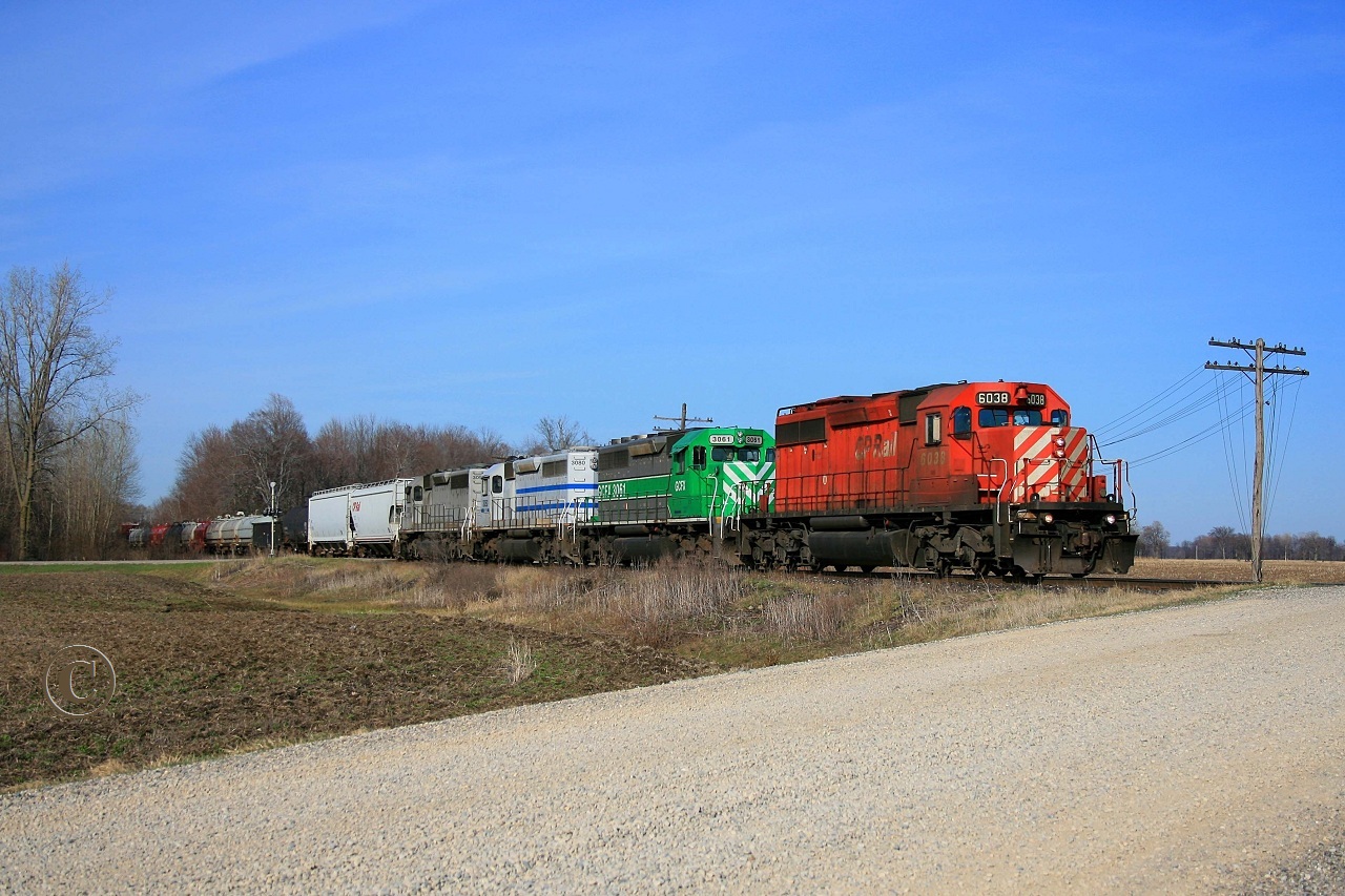 CP 6038 with trailing GFCX units 3061,3080 and 3091 lead westbound train 937 at mile 41 on the CP's Windsor Sub April 16, 2008.