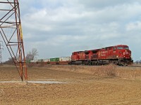 CP 9830 and 9649 haul eastward train 244 at mile 91.79 on the CP's Windsor Sub March 13, 2012