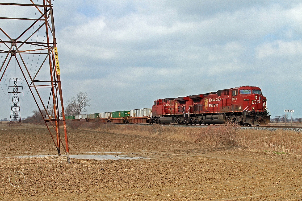 CP 9830 and 9649 haul eastward train 244 at mile 91.79 on the CP's Windsor Sub March 13, 2012