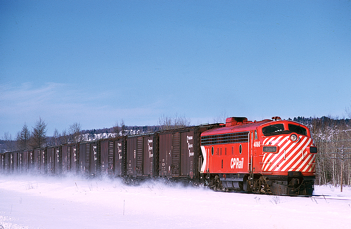 Eastbound Extra Freight with a F unit and some 40 foot boxcars
