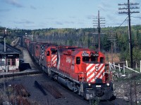 An eastbound is just clearing the Algoma Central diamond on a chilly fall day.
