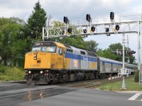 A WB Via train flies through Clarkson Rd under the new signal bridge.