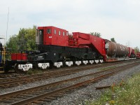 CEBX 800 slowly rolls into the yard at Aldershot, where it will lay over until its evening departure on CN O915.  CEBX 800 is the worlds largest freight car, seen here carrying a load built by Hooper Welding in Oakville bound for a refinery in Kansas; with a 15MPH speed restriction, it will be weeks until it reaches the customer.