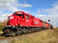 CP 6243 leads CP 543 west past the east siding switch at Tilbury