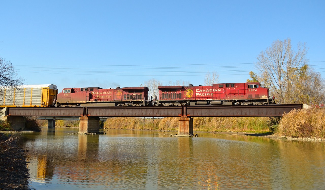 CP 240 heads eastbound towards Chatham as it crosses the bridge by Merlin Road.