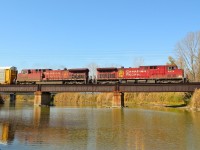 CP 240 heads eastbound towards Chatham as it crosses the bridge by Merlin Road.