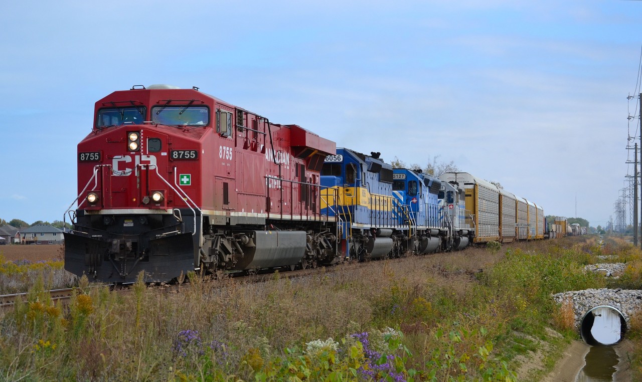 CP 241 with a colorful mixbag of power, heads westbound towards Walkerville after just departing the siding at Belle River.