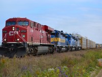 CP 241 with a colorful mixbag of power, heads westbound towards Walkerville after just departing the siding at Belle River.