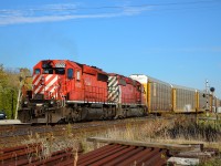 CP 543 with a pair of SD40-2's, pulls into the siding in Tilbury to let CP 244 pass by eastbound. CP 543 is the new train number taking the place of CP 441