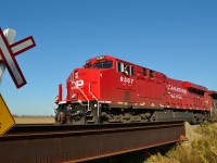 Conductor Jerome Meloche gives a friendly wave as he passes thru Tilbury on CP 141