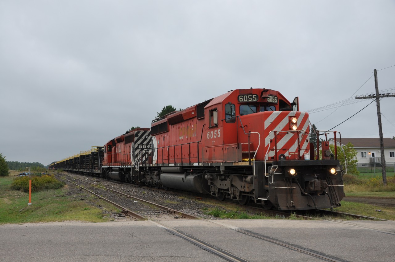 The last train ever to call at Chalk River, Ontario prepares to depart for points west to continue the CWR salvage operations of the North Bay sub. A sad day indeed for railroading in the Ottawa Valley.