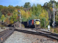 CN 480 led by a pair of GTW's, sits in the siding at South Parry waiting for an oncoming CN 301 to cross over onto the CP trackage.