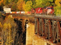 A long CP #234 with 9701 leader crosses the Mud Lake Trestle early morning October 13, 2012