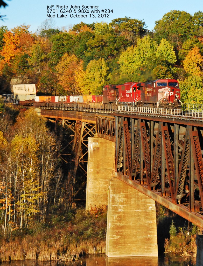 A long CP #234 with 9701 leader crosses the Mud Lake Trestle early morning October 13, 2012