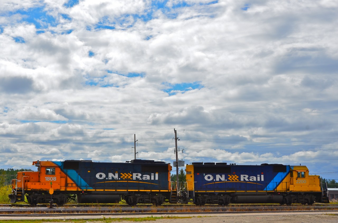 Clouds gather over the Ontario Northland’s future, following the Ontario government’s announcement in March 2012 of plans to sell the railway to the private sector. GP38-2 #1808 and SD40-2 #2200 have yarded their freight train and wait in front of the Cochrane station to be moved to the shop area.