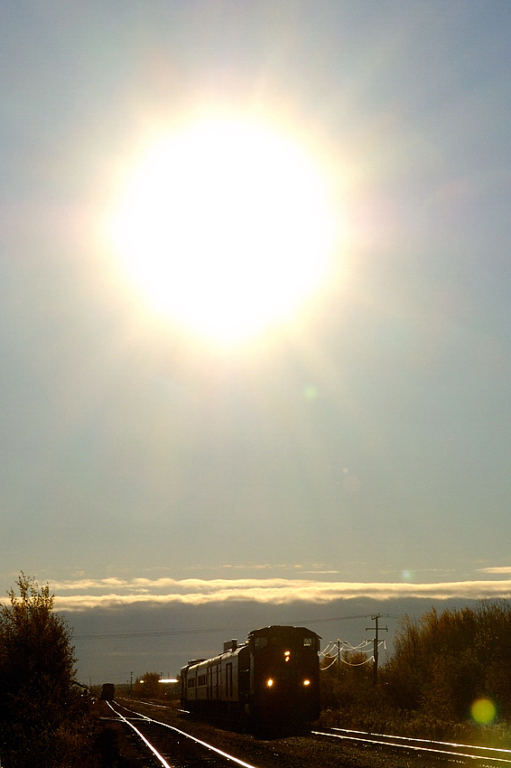 Shortly after 08:30, CN's (highly subsidized) thrice weekly passenger train departs for Sault Ste. Marie. Today's train consists of two baggage cars, two coaches the auxilary unit bringing up the rear.