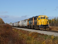 Truddling along the former Canadian Northern mainline that connected Manitoba with Quebec, Work ONT 2202 crawls painfully slow eastward with approximately 30 empties for the Agrium plant. The crew is only a couple miles from hitting the 20 mile spur appropriately named after it's only customer... The Agrium Spur.