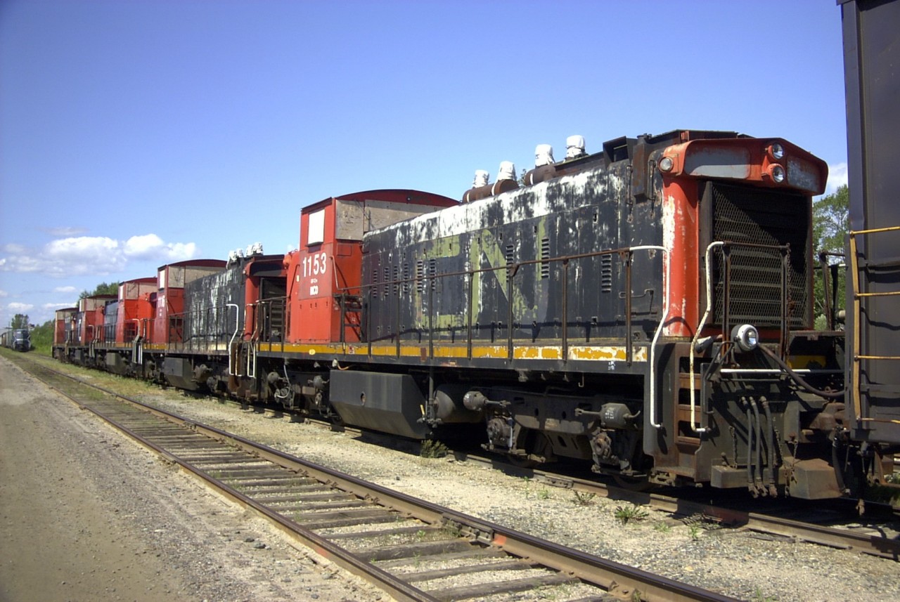 As evidenced by the stenciling on the sidewall of the cab, this ex-CN GMD-1 most recently did time at the I.N.C,O, facility in Copper Cliff, ON before being retired once again to a deadline.  Here it sits with four of its brothers, all waiting their fate, and hoping for yet another life with a shortline or industrial railroad somewhere.