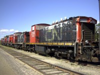 As evidenced by the stenciling on the sidewall of the cab, this ex-CN GMD-1 most recently did time at the I.N.C,O, facility in Copper Cliff, ON before being retired once again to a deadline.  Here it sits with four of its brothers, all waiting their fate, and hoping for yet another life with a shortline or industrial railroad somewhere.