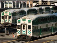 It's 5:18pm, and the rush hour dance of trains in and out of Union Station is in full swing. GO cab car 248 on Barrie line train #805 and 237 on Lakeshore West #483 depart the train shed, with commuters leaving Toronto crammed into both levels of each car.