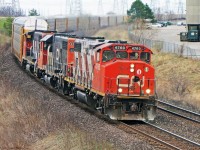 Busier month end traffic and later trains prompt CN to run the 570 from Oshawa to Mac Yard,and often has great consists as seen rounding into the many curves on the approach to Doncaster.