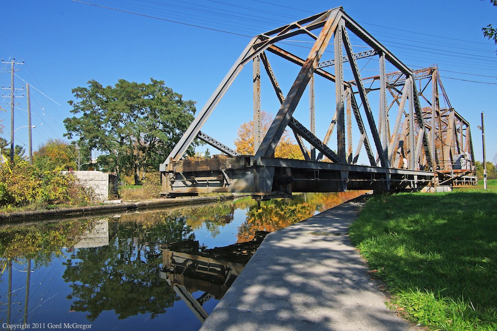 The hand operated 1917 swing bridge is slowly turned into place as the Havelock approaches.