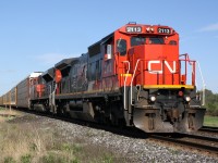 CN 2113 is cruising through Lynden Ontario on a warm May morning.  This was the first ex CNW unit that I have seen leading a freight.  This was an added bonus of a quick stop at the crossing.  Once 2113 cleared CN 393 arrived with a GOT unit dead in tow!  Which made for two good trains in under an hour.