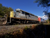 CN O48031 08 sits waiting on CP 423-08, CN M30131 08 at South Parry.