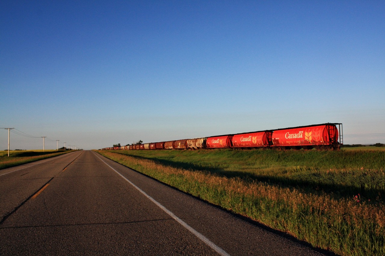 With in several months the wheels on these stored CN hoppers seen parked along Highway 2 to on the Colonsay Spur will turn as they will be pulled out of storage and put into service.