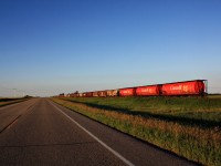 With in several months the wheels on these stored CN hoppers seen parked along Highway 2 to on the Colonsay Spur will turn as they will be pulled out of storage and put into service.