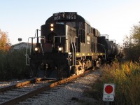 Trillium #1859 is seen running along the Harbour Spur with 3 tank car from Port Colborne.